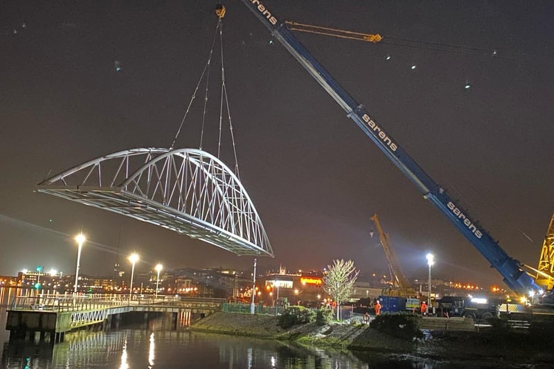 The Pennyburn foot and cycle bridge was officially set in place by contractor, FP McCann Ltd, last night. This is a key stage in the project which will see the the bridge and greenway link to Bay Road Park open to the public later in the Spring. The project is funded by the INTERREG VA Programme, administered by the Special EU Programmes Body and the Department for Communities.