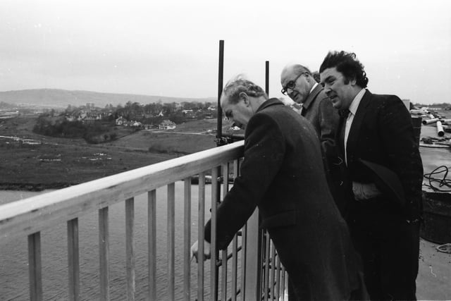 SDLP Leader John Hume with construction firm representatives and dignitaries during a visit by the European Commissioner for European Commissioner for Taxation, Consumer Affairs, Transport and Parliamentary Relations,  and Inter-institutional Relations and Administration, Richard Burke.