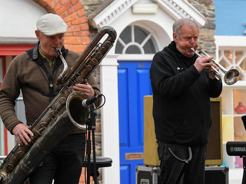 Stewart ‘Sax’ McDonald and George Hasson perform in the Craft Village on Saturday. Photo: George Sweeney