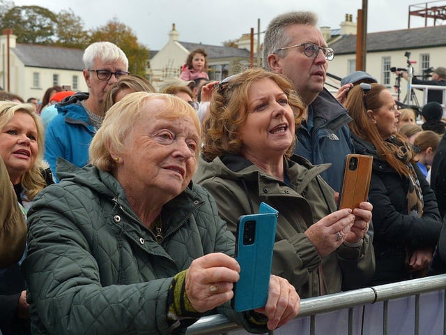 Prople in Ebrington Square sing along during Phil Coulter’s live performance of his iconic hit ‘The Town I Loved So Well' on Saturday afternoon last. Photo: George Sweeney. DER2240GS – 25