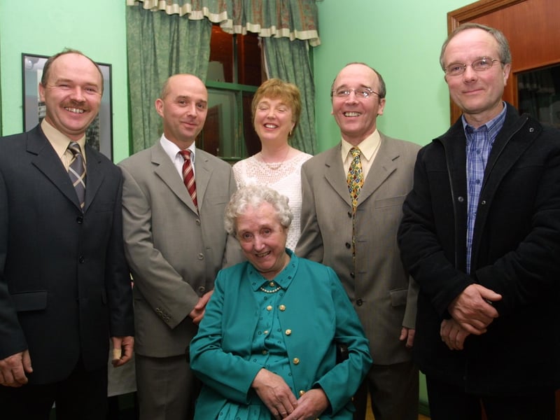 George Nelis, Jim Nelis, Helen O'Kane, Paddy Nelis, seated, Tess Nelis.
