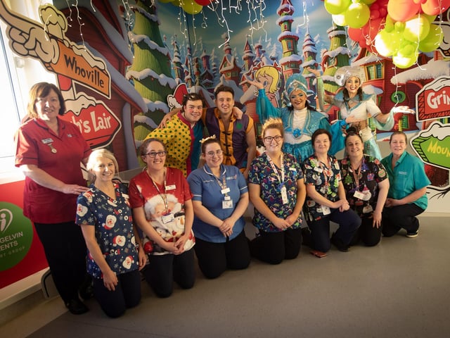 Characters from 'Aladdin' the 2024 Christmas Pantomime at the Millennium Forum pictured with staff during a visit to the Children's Ward at Altnagelvin Hospital on Thursday afternoon.