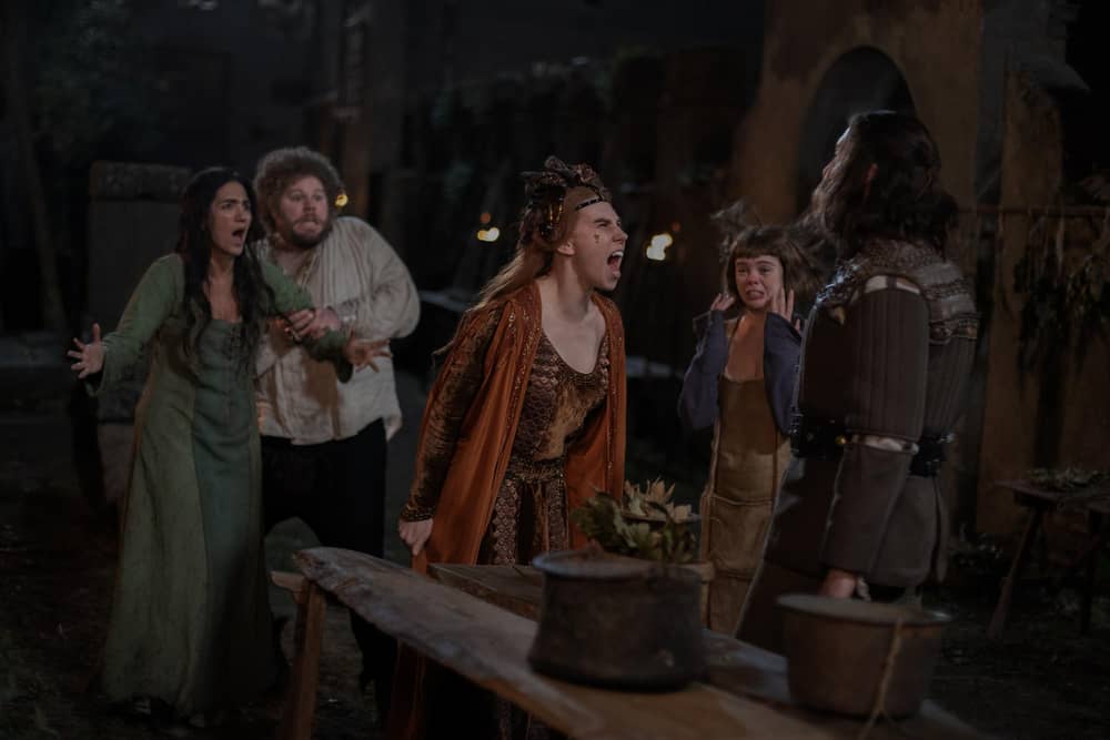 Decameron. (L to R) Leila Farzad as Stratilia, Douggie McMeekin as Tindaro, Zosia Mamet as Pampinea, Saoirse-Monica Jackson as Misia and Tony Hale as Sirisco in Episode 105 of Decameron. Giulia Parmigiani/Netflix © 2024