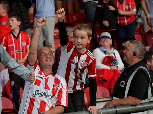 Derry City fans celebrate Will Patching’s winning goal against against Sligo Rovers on Friday evening. Photo: George Sweeney. DER2327GS – 072