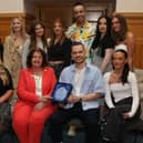 Atelier Hair Salon reception 1 - Mayor Patricia Logue presenting a piece of commemorative crystal to Ronan Stewart, to mark the success of Atelier Hair Salon winning the All Ireland Salon of the Year Competition. Included are members of staff.  (Photo - Tom Heaney, nwpresspics)