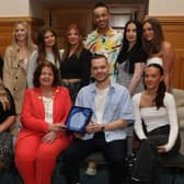Atelier Hair Salon reception 1 - Mayor Patricia Logue presenting a piece of commemorative crystal to Ronan Stewart, to mark the success of Atelier Hair Salon winning the All Ireland Salon of the Year Competition. Included are members of staff.  (Photo - Tom Heaney, nwpresspics)