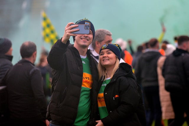 Fans of Watty Graham’s, Glen, take a selfie against the celebrations of their club’s SFC final victory over Slaughtneil in Celtic Park, on Sunday afternoon.  DER2243GS – 019