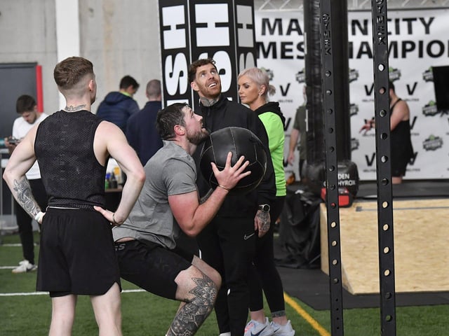 Competitor at the ‘Wal Ball’ station during the Maiden City Hyrox V Fitness Challenge held at Sean Dolans GAC on Saturday. Photograph: George Sweeney