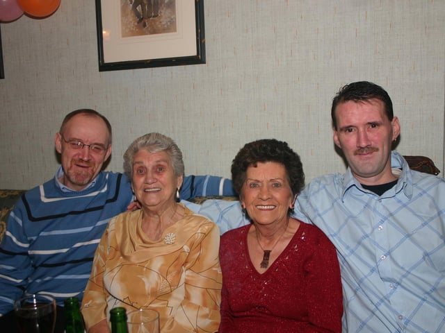 Party time is here as Brian, Annie Bridie and Tony enjoy the night in the Rocking Chair. 2265/dd : Parties and celebrations January 2006: Noreen Kennedy.