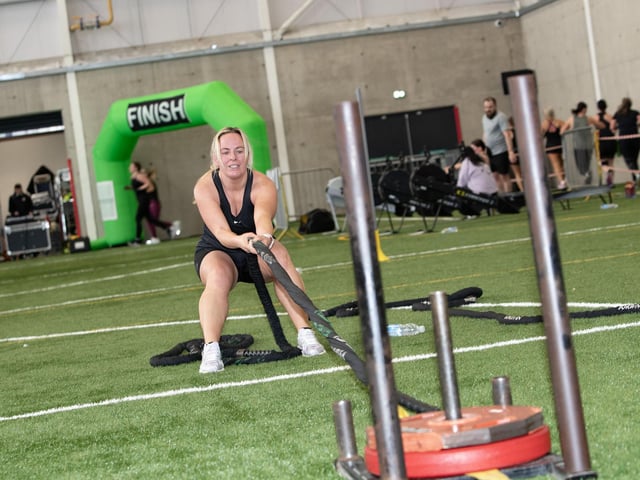 Michelle Glenn shows her strength during the Rope Pull on Sunday.