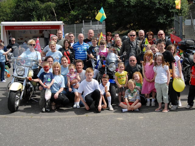 Local children pictured at the Gasyard Wall Feile '08 with the Bikers for Charity group and Feile volunteers at their Fun Day. 2607Ap2
