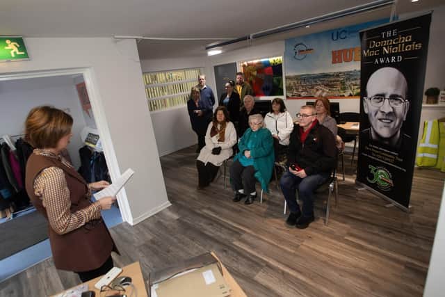 Jayne Quigg, Manager, Dove House Community Trust, speaking at the launch of the second Donncha MacNiallais Award on Friday last. Included are the Mayor, Patricia Logue, members of Donncha's family and DHCT board members.