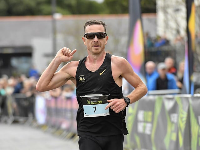 Letterkenny AC’s Danny Mooney finishes in second place in the 2025 Waterside Half Marathon. Photo: George Sweeney