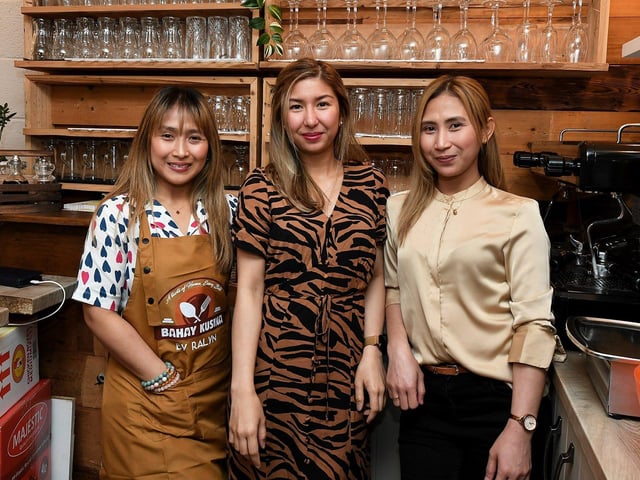 Kristine, Apple and April pictured at the opening of Derry’s first Filipino restaurant, called Bahay Kusina, in the Craft Village, on Saturday afternoon. Photo: George Sweeney