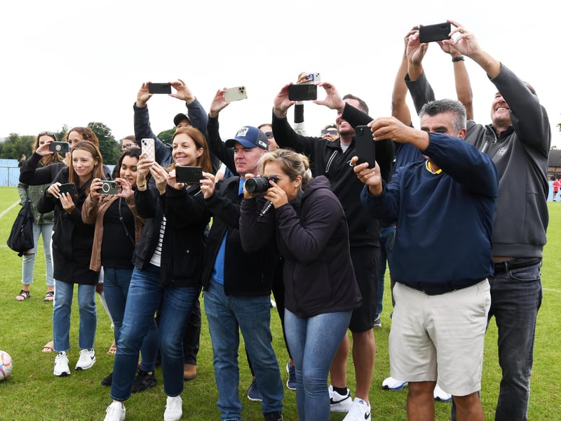 Proud parents and supporters capture photos of the winning O'Neill's Foyle Cup Girls Under-15's Surf Select (USA) team. (Photo: Keith Moore)