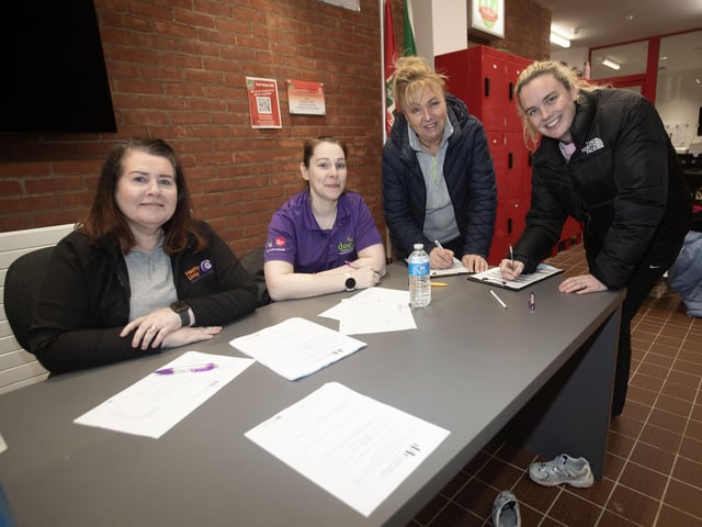 Some of the participants signing in for Tuesday's 'Live Better' Health Checks in Creggan Patricia McGurk and Ciara McGurk, under the guidance of Wendy McLaughlin and Kathleen McNaught, Old Library Trust. (Photos: Jim McCafferty Photography)