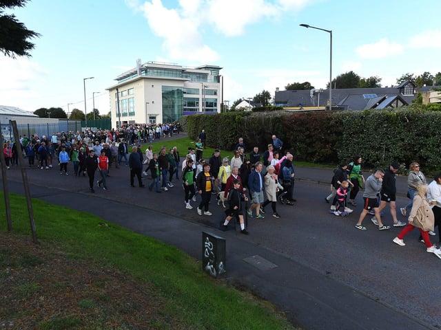 The Chieftain’s Walk moves off along Bay Road towards Foyle Road. Photo: George Sweeney