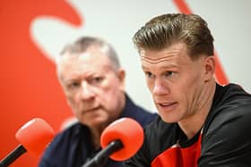 James McClean, right, and Chairman Philip O’Doherty during the former Ireland international's signing earlier this year.