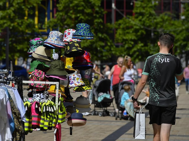 Sun hats on sale in the city centre. Photo: George Sweeney