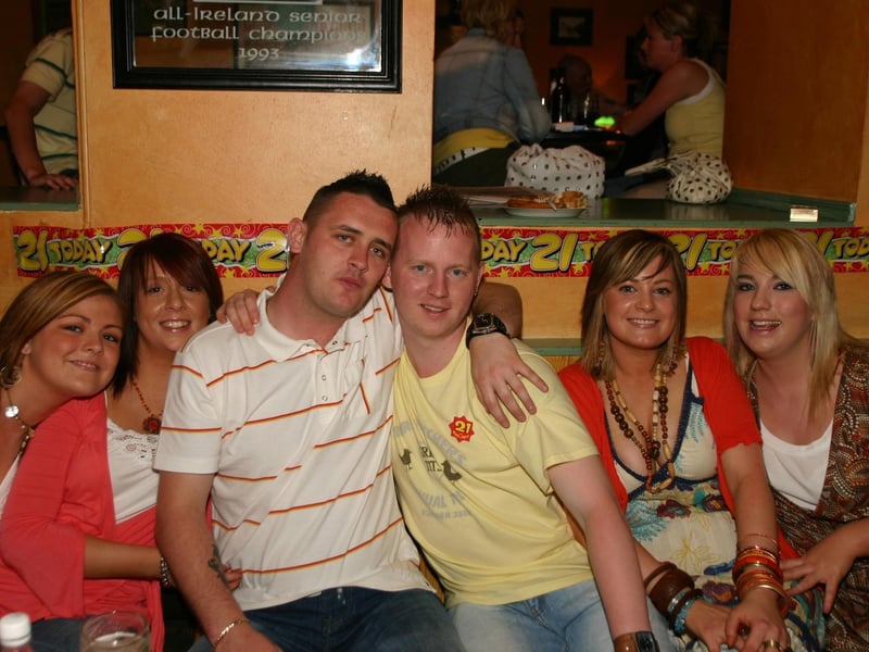 Laura and Sean with a group of friends who travelled a long way for the surprise birthday party in the Oak Grove 7023dd : Parties in Derry in July 2005.