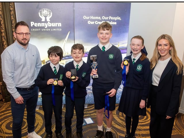 Competition B winners from St Patrick's P.S., Darragh, Edith, Joe and Ben with Frank Doherty (CEO). Photos: P McKane.