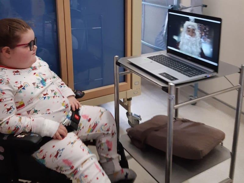 Mollie McIntyre with Santa via Skype with help from North West Regional College.
