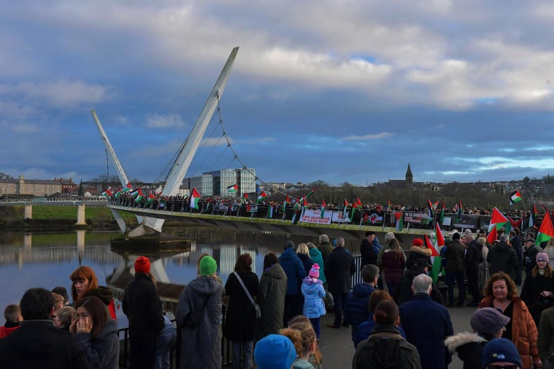 Hundreds of people gather on Derry’s Peace Bridge, on Sunday afternoon, in solidarity with Gaza and Palestinians. Photo: George Sweeney.