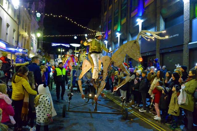 The colourful Derry Christmas Lights parade makes its way along Ferryquay Street last year. Photo: George Sweeney.  DER2147GS – 004