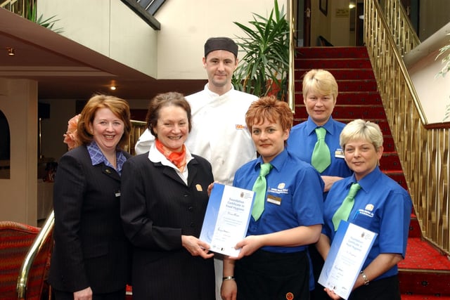 White Horse Hotel staff receiving their Food Hygiene certificates.