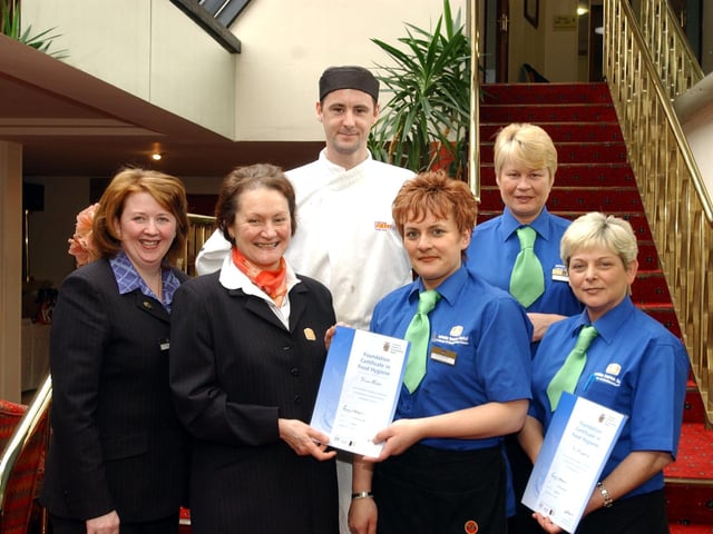 White Horse Hotel staff receiving their Food Hygiene certificates.