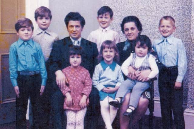 John and Marie Toland with their children Richard, Danny, Sean, Martin, Elizabeth (Lily), Siobhan and Majella.