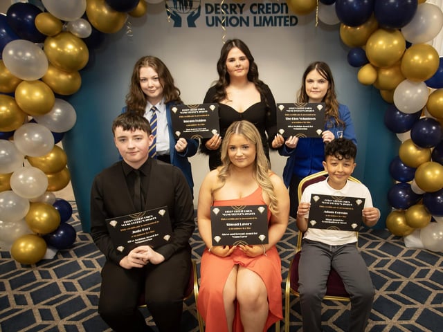 Derry Credit Union's Young People's Awards 2025 nominees being presented with their certificates by Abbie Doherty (centre, back), Youth Committee, on Monday night. At front are Jude Kerr, Sinead Lavery and Adam Geresus. At back are Imogen Holden and a representative from The Glen Volunteers.