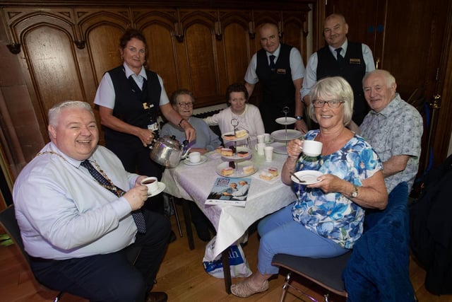 A CUPPA AND A CHAT!. . . .Deputy Mayor, Darren Guy taking time out from the Mayor's Tea Dance in the Guildhall on Wednesday to have a cuppa and a chat with some of those in attendance. Seated from left are Margaret and Lauren McCarter and Brendan and Veronica Kerr. Included are DCSDC staff Slvia Duffy, Raymond McGuinness and Paddy Wilson. (Photos: Jim McCafferty Photography)