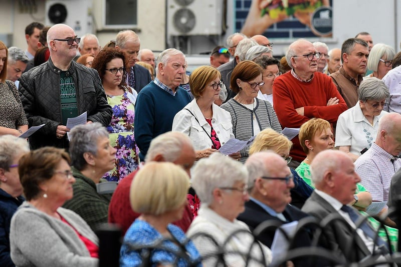 People gather for a service in Claudy marking the 52nd anniversary of the car bombings that killed nine people and injured 30 others. Photo: George Sweeney