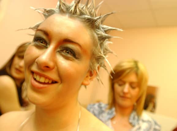 Clare Barron has the final touches applied to her hair by Caroline Taggart at the NWIFHE Annual Hairdressing Show.
