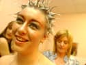 Clare Barron has the final touches applied to her hair by Caroline Taggart at the NWIFHE Annual Hairdressing Show.
