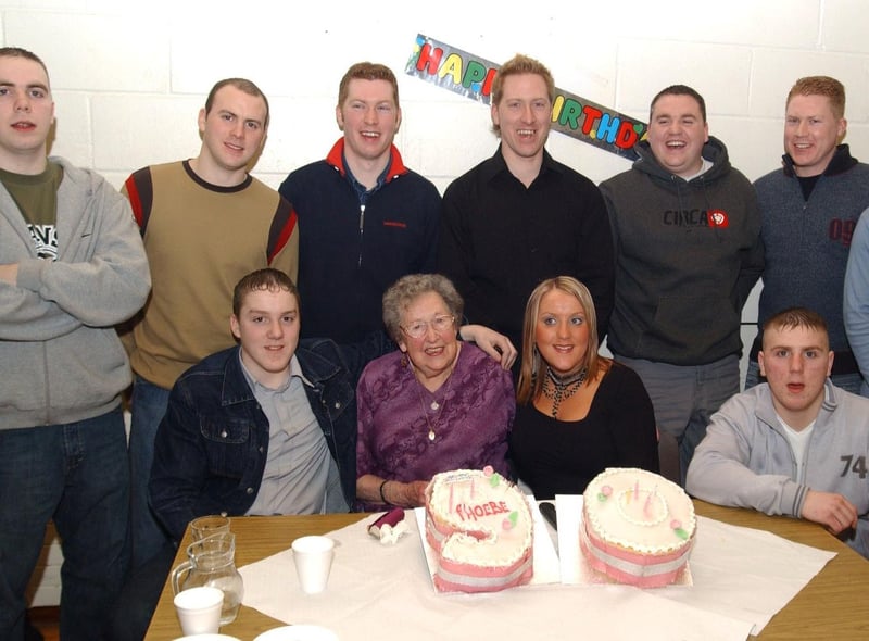Phoebe Doherty with nine of her grandsons and her only granddaugther in Derry at her 90th birthday party. Included are, Paul, Kevin, David, Joesph, Sean, Brian, Kieran, Christopher, Niell and Carolanne. (2502CG12)