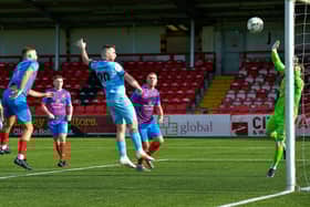 Institute’s Cathair Friel heads home their first goal against Ards, on Saturday.  Picture by: George Sweeney.  DER2241GS – 72