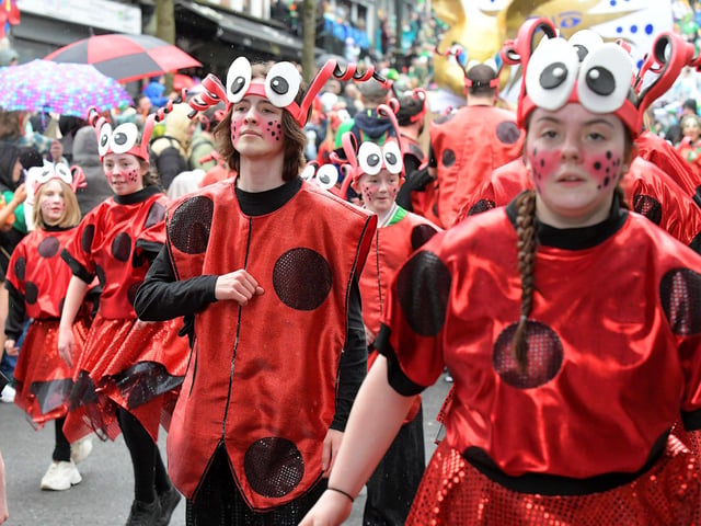 The Derry St Patrick’s Day parade makes its way towards the city centre. Photo: George Sweeney.