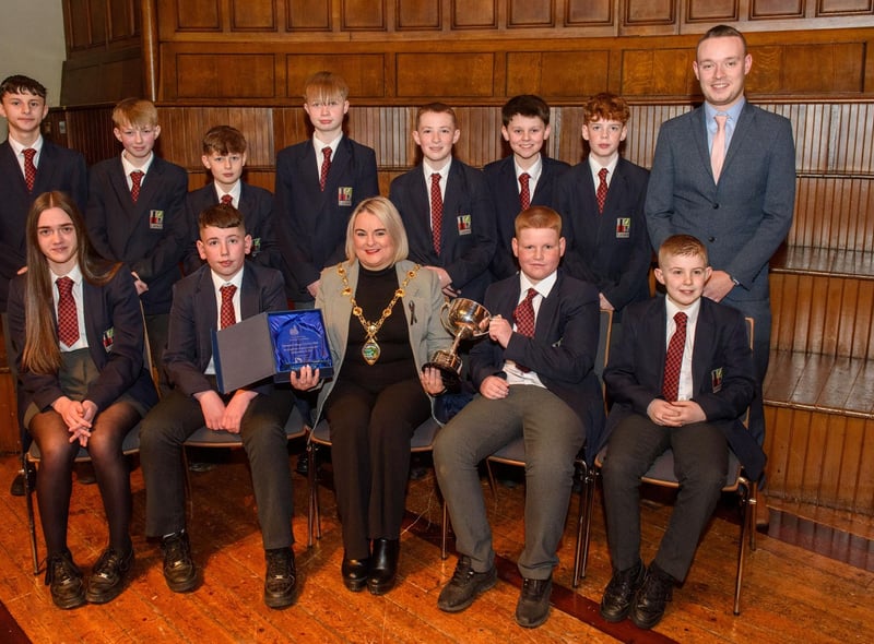 The Mayor Councillor Sandra Duffy welcomed pupils from Lisneal College to the Guildhall as she recognised the hugely successful cricket teams who claimed four trophies last season including the,  U13 Slemish Cup winning team and coach Craig Peters. Picture Martin McKeown. 26.01.23:.