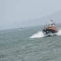 Lough Swilly RNLI were tasked by Malin Head Coast Guard after a member of the public reported two people cut off by the high tide in the Lambs Bay area of the Lough.
