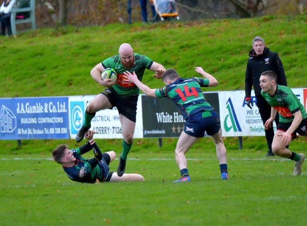 City of Derry’s Davy Graham gets by Clogher Valley pair David Wilson and Adam Boles last week at Judges Road. Photo: George Sweeney.  DER2247GS – 122