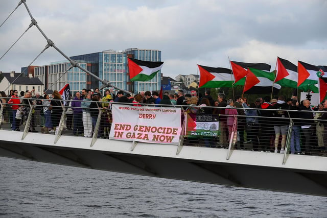 People gathered on the Peace Bridge for a Vigil for Gaza on Friday evening, organised by the Derry Irish Palestinian Solidarity Campaign. Photo: George Sweeney