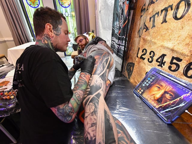 Tattoo artists at the annual Maiden City Ink International Tattoo Convention held in the Everglades Hotel. Photo: George Sweeney