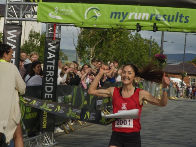 Female winner of the Waterside Half Marathon Catherine Whoriskey crosses the finish line.