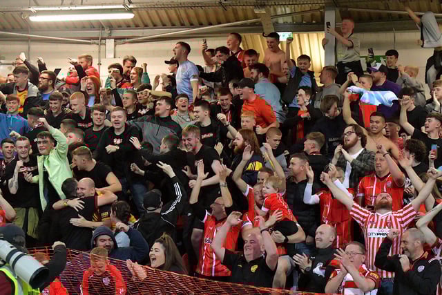 Fans celebrate Derry City’s win over KuPs at the Brandywell. Photo: George Sweeney. DER2330GS -