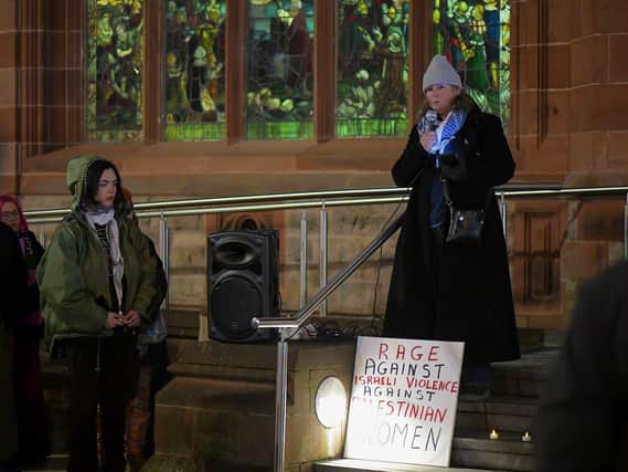 Anita Villa, Alliance for Choice Derry, speaking at a rally held at Guildhall square on Friday evening in a protest at violence against women and girls following the recently reported rape of a woman in the city. Photo: George Sweeney