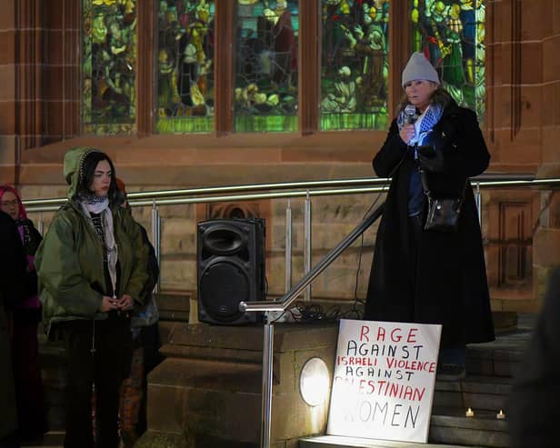 Anita Villa, Alliance for Choice Derry, speaking at a rally held at Guildhall square on Friday evening in a protest at violence against women and girls following the recently reported rape of a woman in the city. Photo: George Sweeney