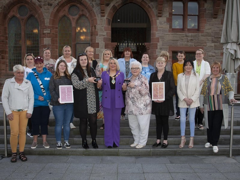 WOMEN’S GROUPS AT GUILDHALL . . . .The Mayor of Derry City and Strabane District Council, Sandra Duffy, making presentations to Tullyally and Galliagh Women’s Groups to mark the work they do within their communities and together throughout the city and district, at a reception in the Guildhall on Tuesday evening. (Photos: Jim McCafferty Photography)