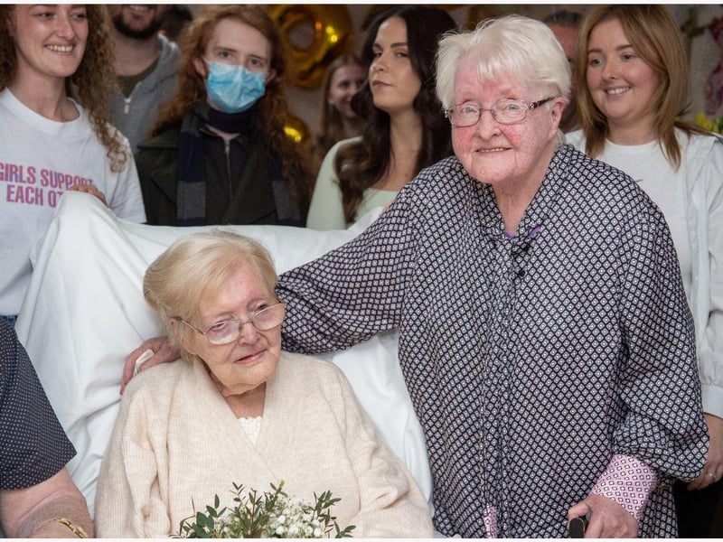 Molly Campbell celebrating her 90th birthday with her family.